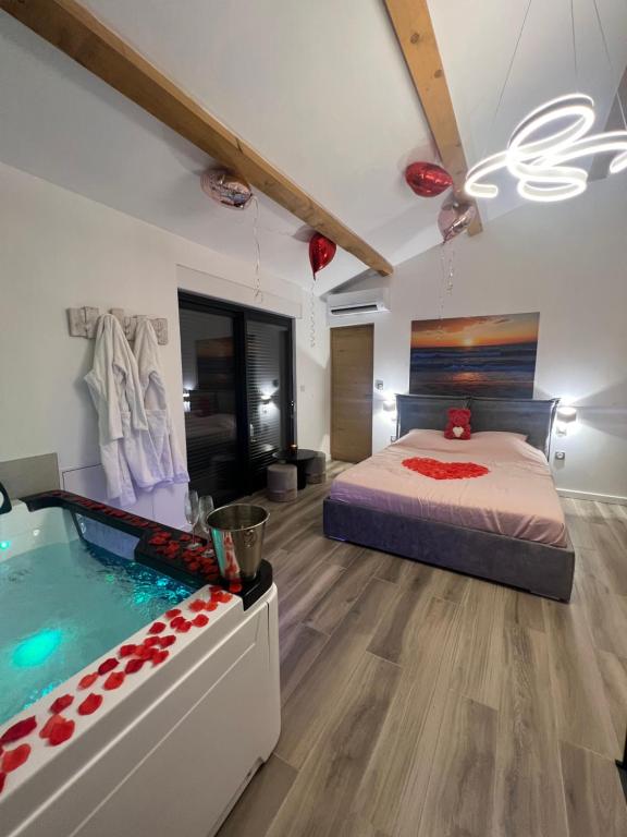 a bedroom with a bed and a swimming pool at Magnifique loveroom in Marseille