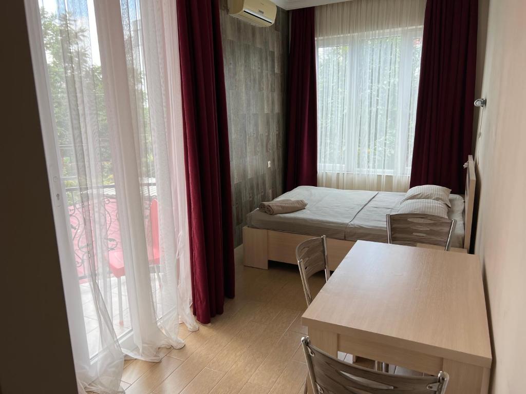 Postel nebo postele na pokoji v ubytování Gold Guest House