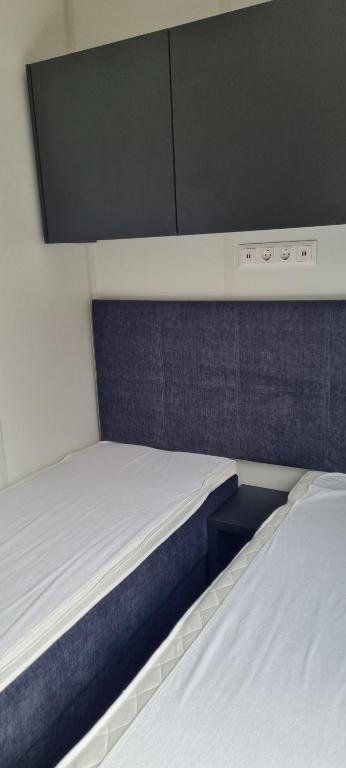 Postel nebo postele na pokoji v ubytování Waldseechalet Julius - Wemding