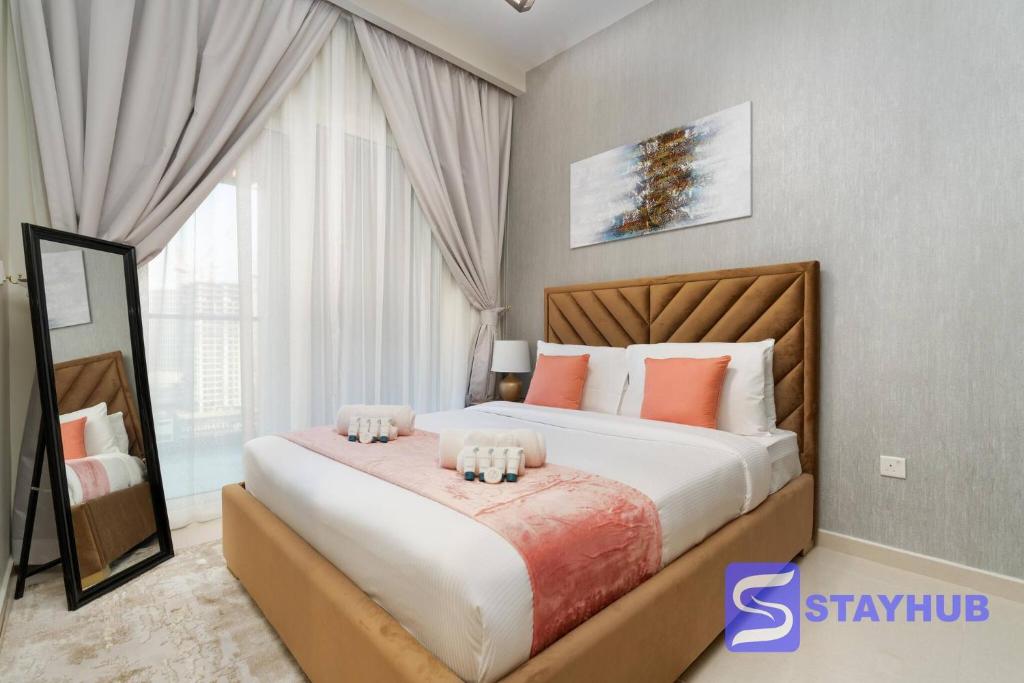 Postel nebo postele na pokoji v ubytování Lavish 1BR Apt near Dubai Mall