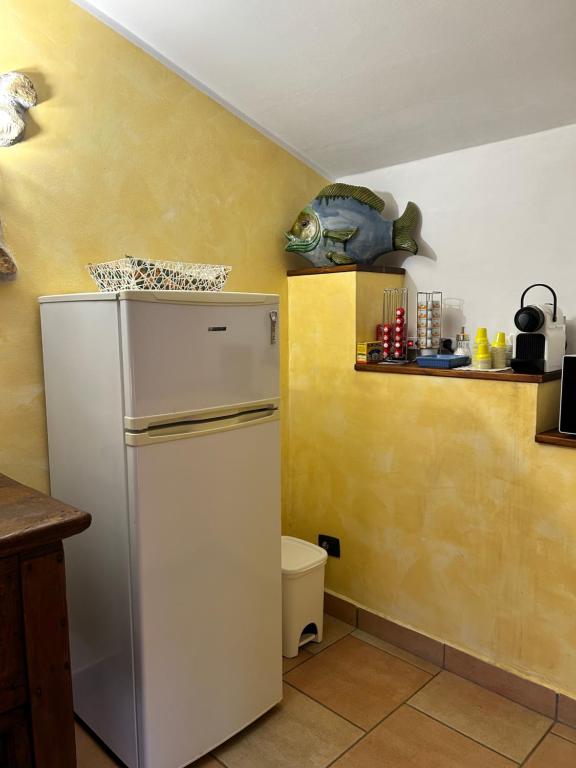 Kuchyň nebo kuchyňský kout v ubytování La Perla di Assisi