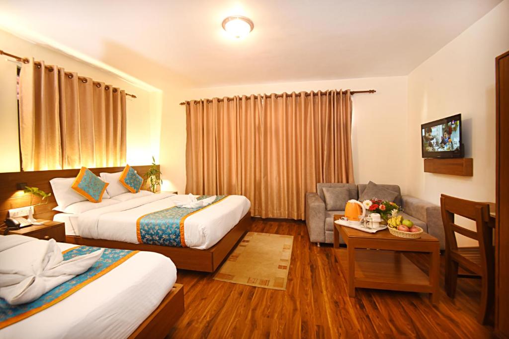 Postel nebo postele na pokoji v ubytování Hotel Amaryllis Kathmandu