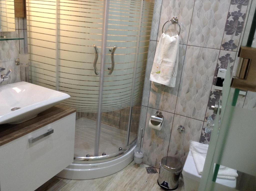 Koupelna v ubytování Mola Hotel