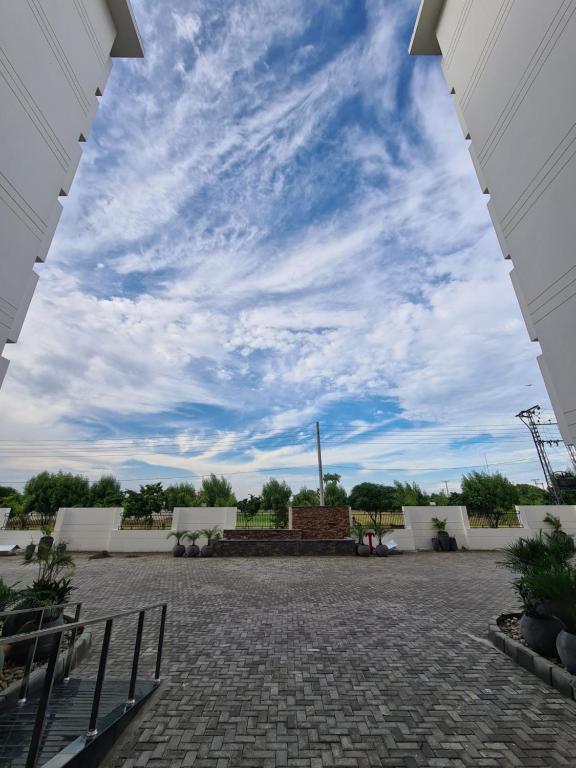 a view of the sky from the patio at 1 Bed Modern Apartment, Pool, Gym, Cinema in Lahore