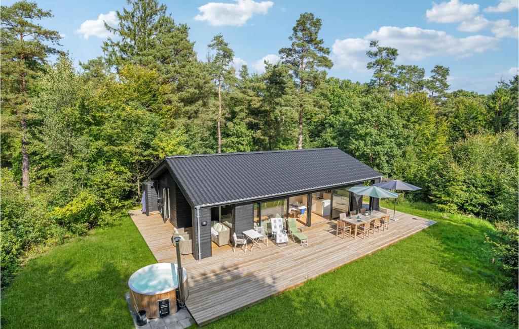 an overhead view of a house with a deck at 3 Bedroom Awesome Home In Silkeborg in Silkeborg