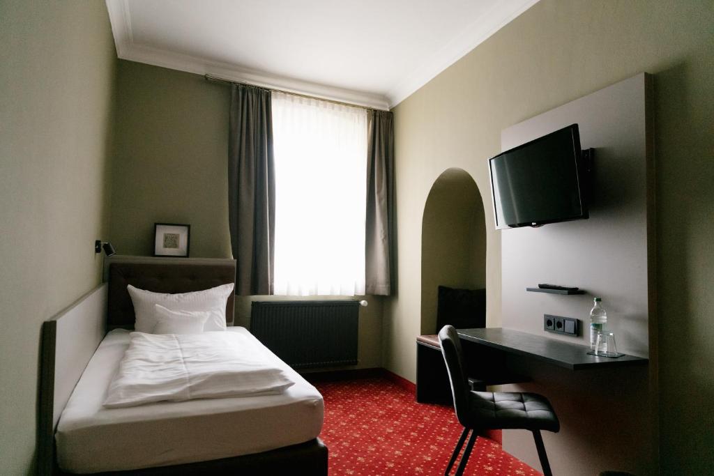 TV a/nebo společenská místnost v ubytování Hotel Fletzinger