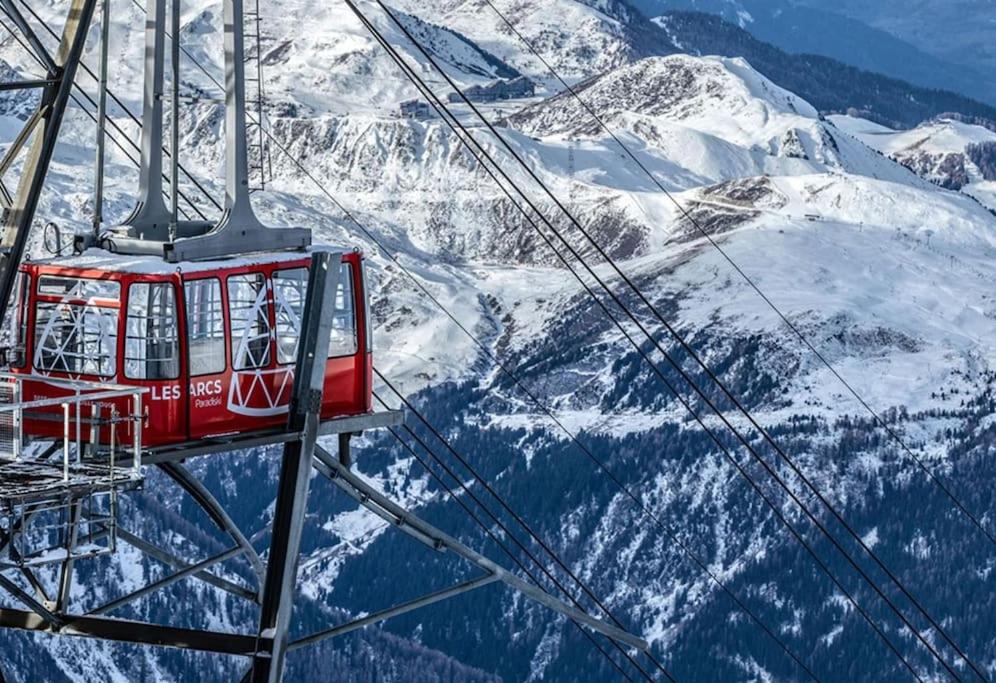 - une balade en gondole sur une montagne enneigée dans l'établissement Grand Arbois Appartement 5 personnes Les Arcs 1800, à Bourg-Saint-Maurice