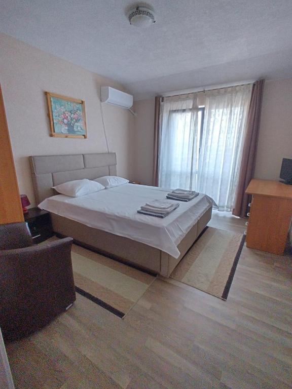 A bed or beds in a room at Vila Nova