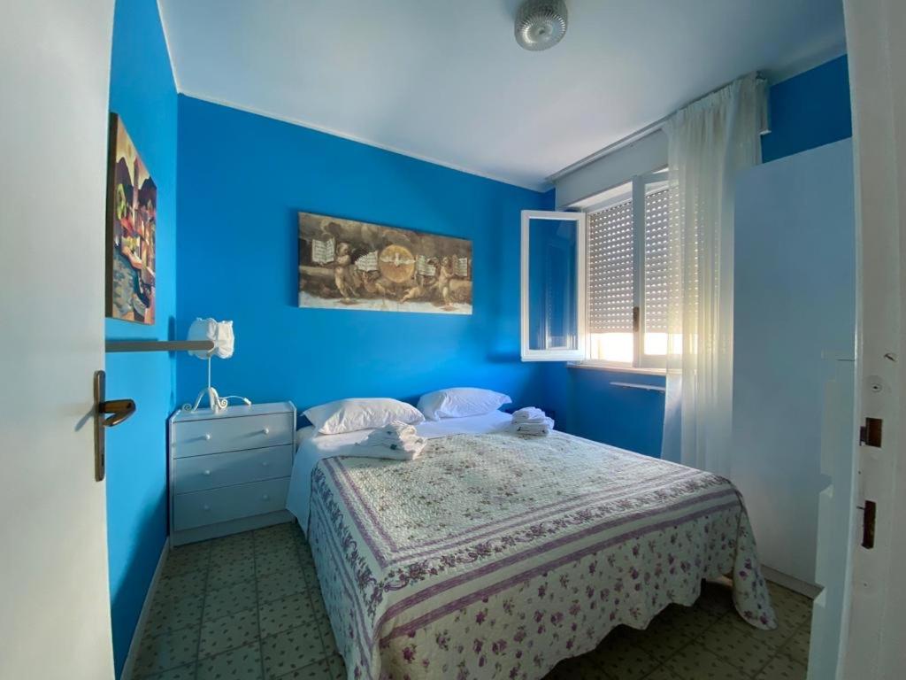 Postel nebo postele na pokoji v ubytování Terrazza sul Golfo di Venere