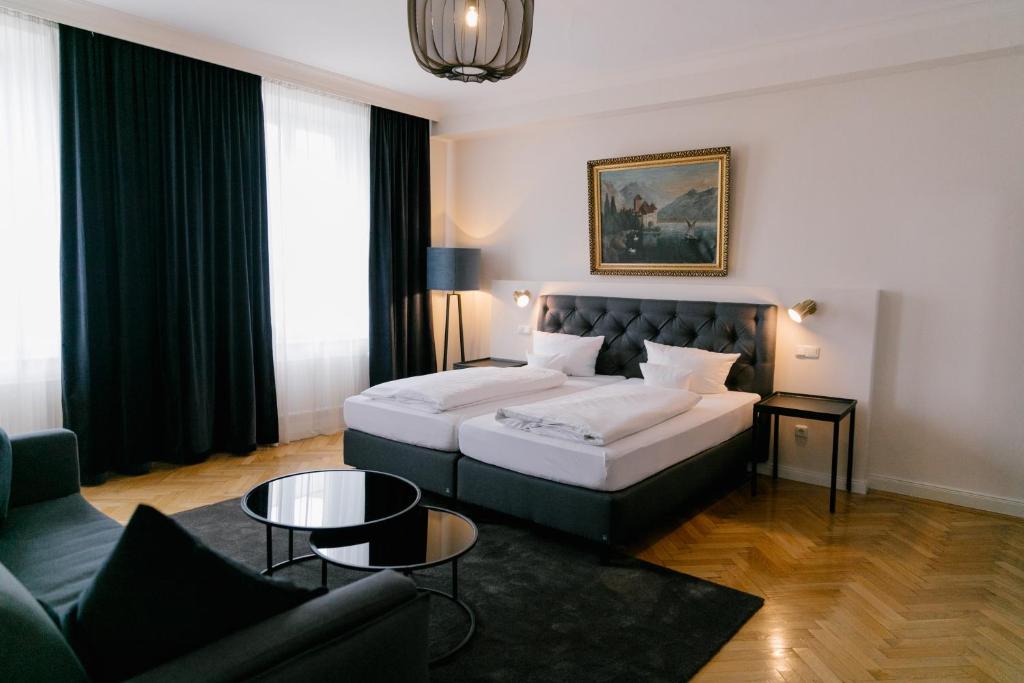 Postel nebo postele na pokoji v ubytování Hotel Fletzinger