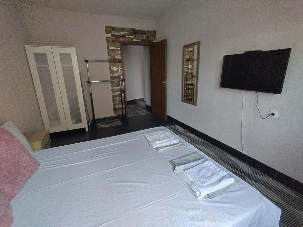 A bed or beds in a room at Vila Nova