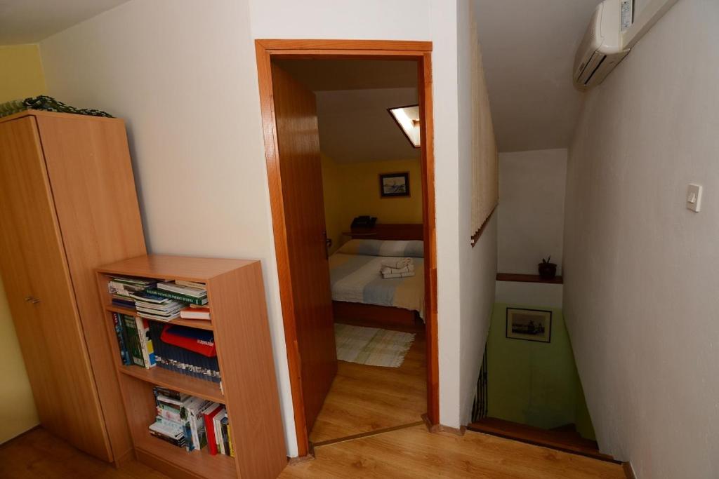 Łóżko lub łóżka w pokoju w obiekcie Apartment Krianca