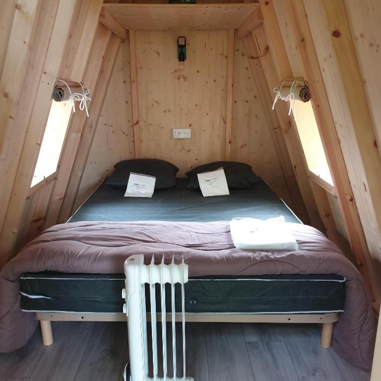 Postel nebo postele na pokoji v ubytování Camping Pyrénées Nature
