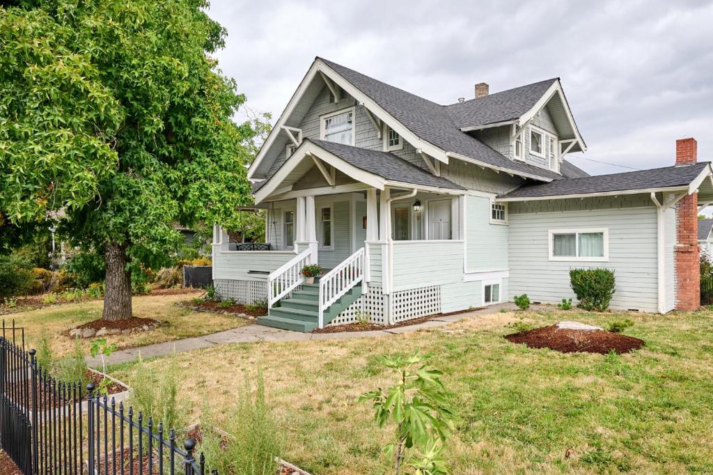 a white house with a yard at Home - Elegant comfort 22 minutes to OSU in Lebanon