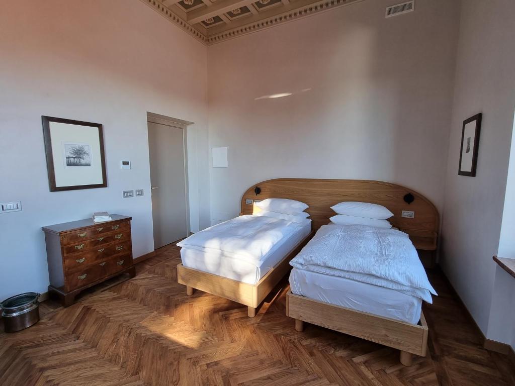 Postel nebo postele na pokoji v ubytování Villa Hermann