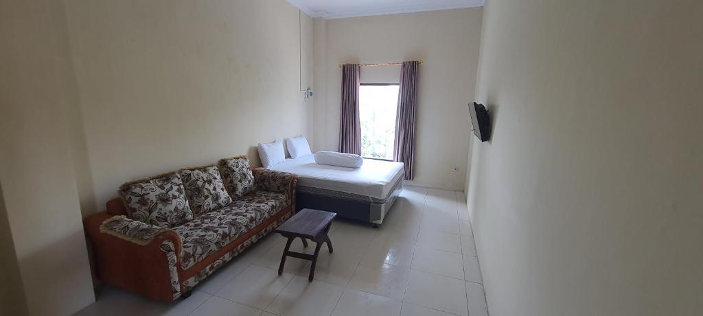 Posezení v ubytování Solo Nadamax City Guest House Syariah