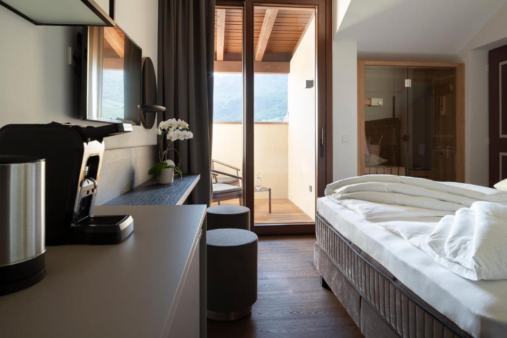 Posteľ alebo postele v izbe v ubytovaní Ansitz Battisti Suites