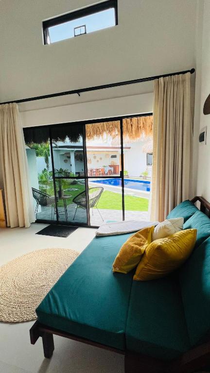 Postel nebo postele na pokoji v ubytování Panglao Lofts