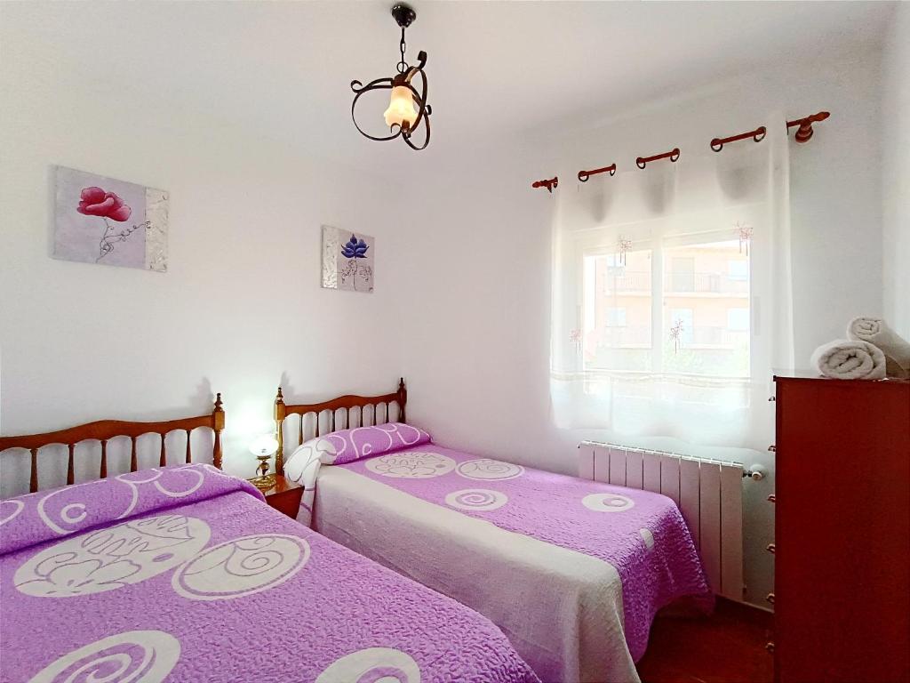 Postel nebo postele na pokoji v ubytování Casa Raspa