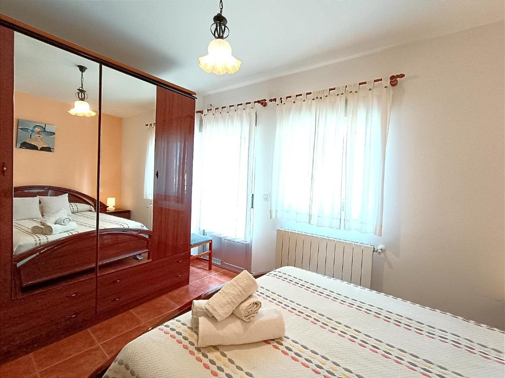 Postel nebo postele na pokoji v ubytování Casa Raspa