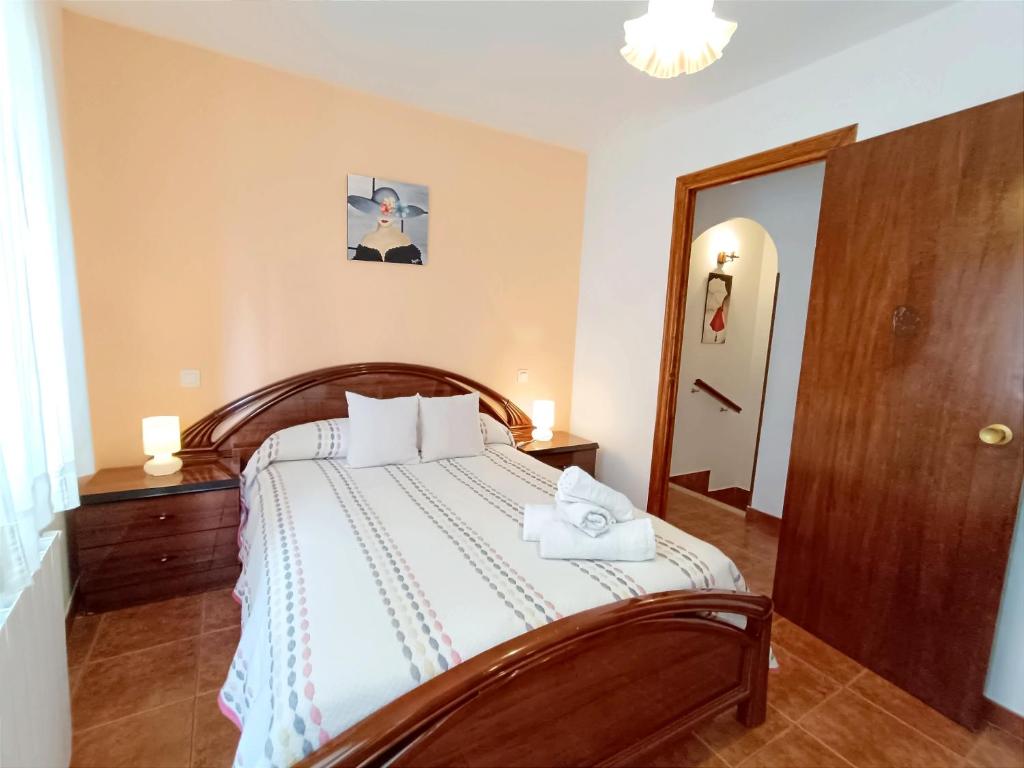 Postel nebo postele na pokoji v ubytování Casa Raspa