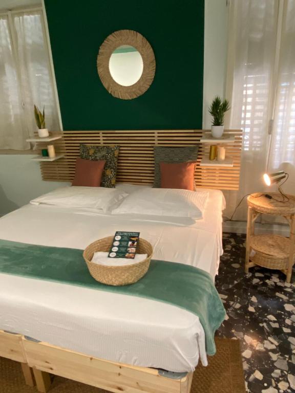 Ένα ή περισσότερα κρεβάτια σε δωμάτιο στο Mahamo Suites