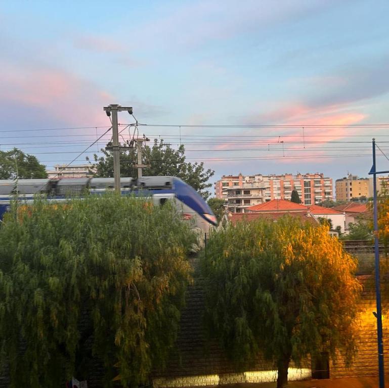 a train traveling down some stairs in a city at Chris&#39;Home2 in Roquebrune-Cap-Martin