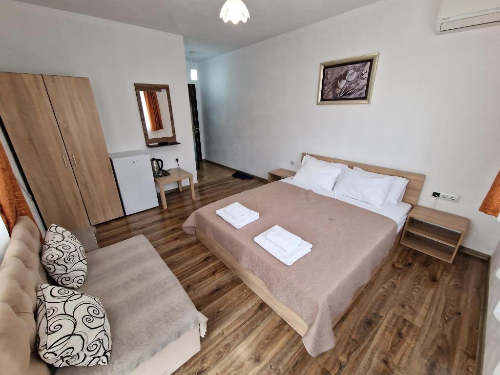 Postel nebo postele na pokoji v ubytování Hotel My House