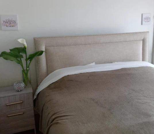 Кровать или кровати в номере El TEMPLO