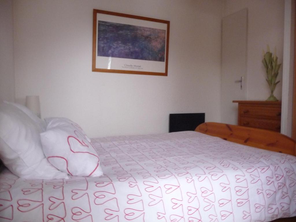 Postel nebo postele na pokoji v ubytování CHALET LES SEQUOIAS DEUX ALPES