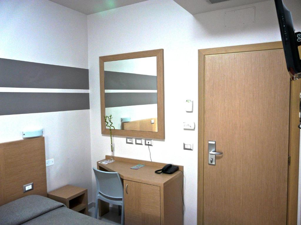 TV a/nebo společenská místnost v ubytování Hotel La Scaletta