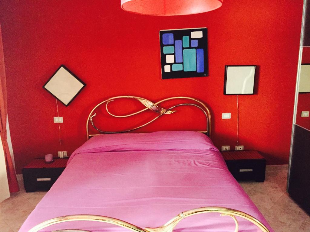 Łóżko lub łóżka w pokoju w obiekcie Atene Apartment