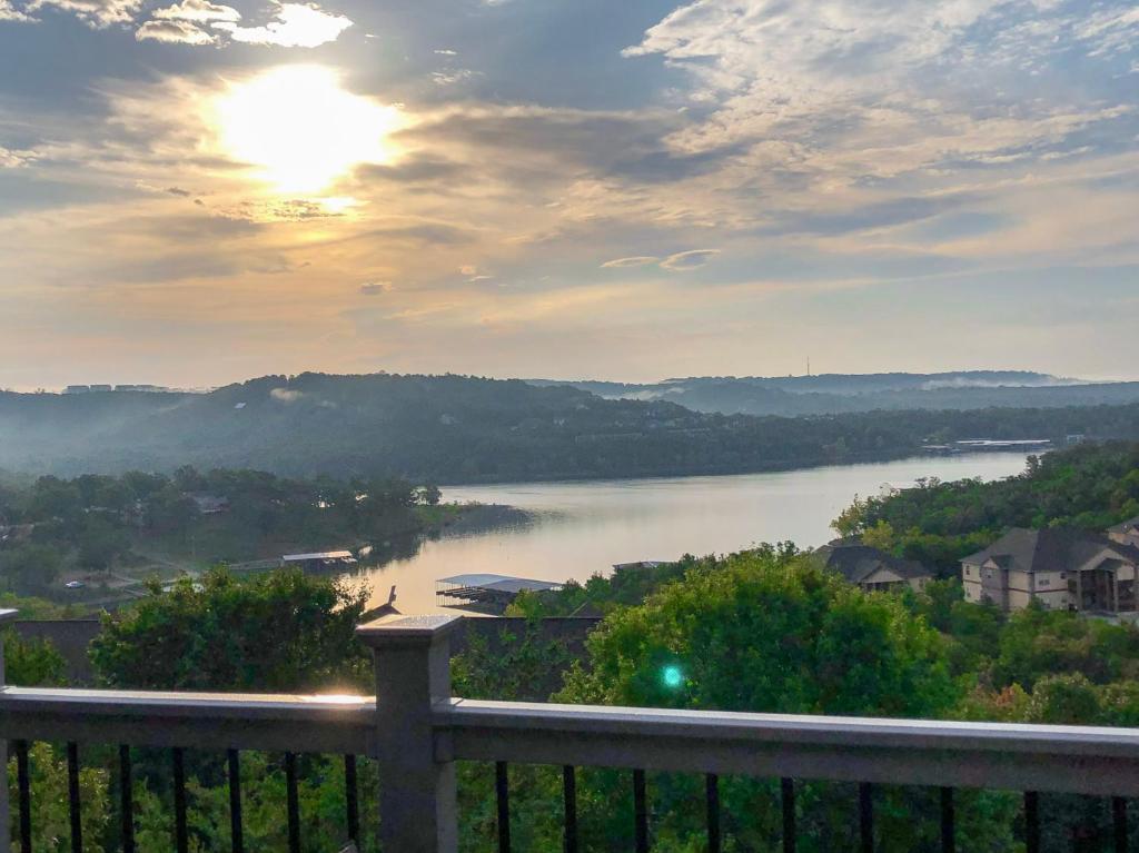 a view of a river with the sun in the sky at Lake View! Walk-In 3 BR Condo - Outdoor Pool - FREE TICKETS INCLUDED - TRH6-6 in Branson