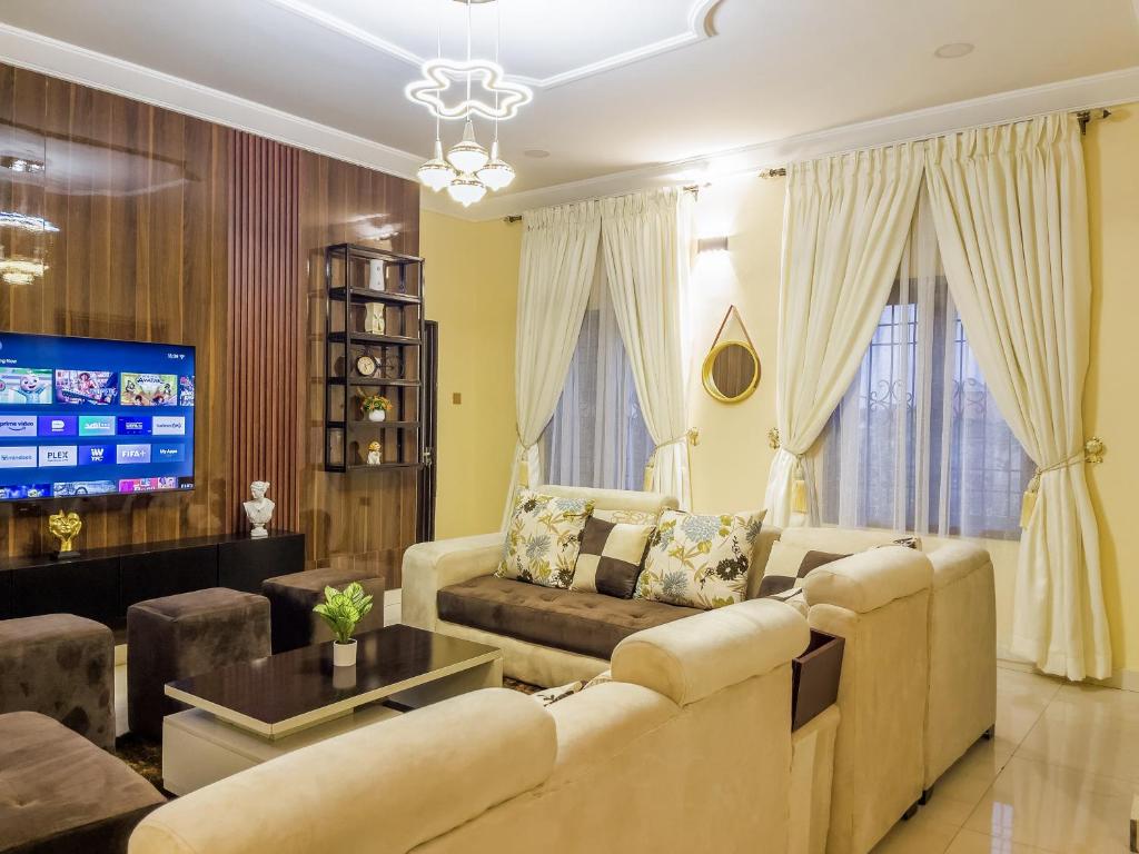 TV a/nebo společenská místnost v ubytování Klaus Residence