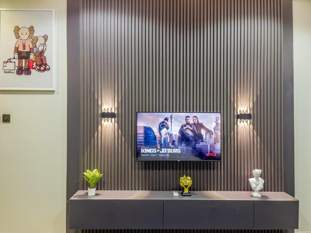 TV a/nebo společenská místnost v ubytování Klaus Residence