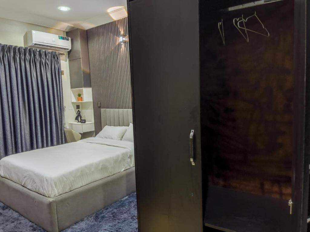 Postel nebo postele na pokoji v ubytování Klaus Residence