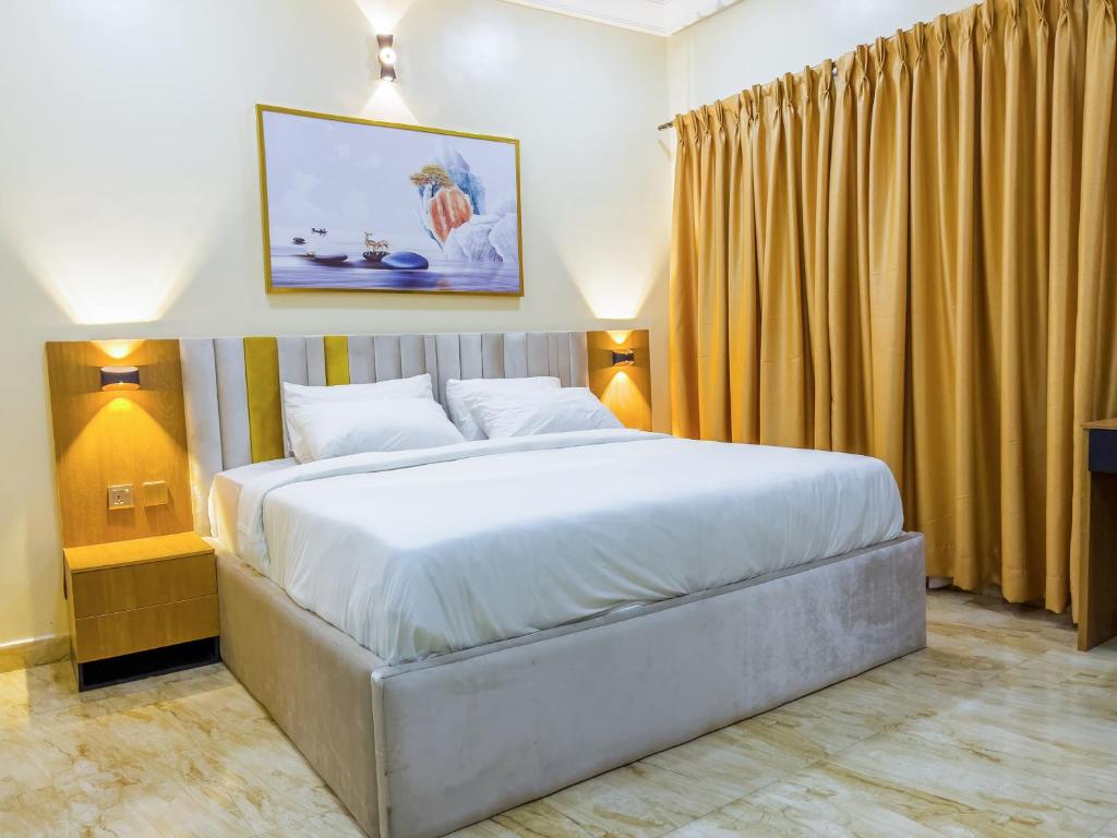 Postel nebo postele na pokoji v ubytování Klaus Residence