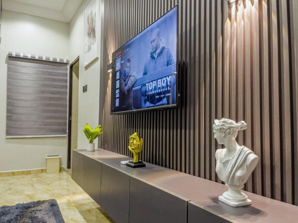 TV a/nebo společenská místnost v ubytování Klaus Residence