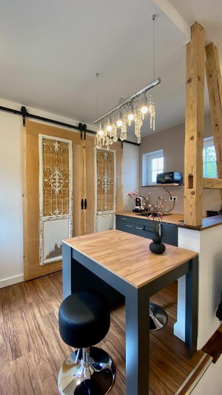 Kuchyň nebo kuchyňský kout v ubytování TinyLoft