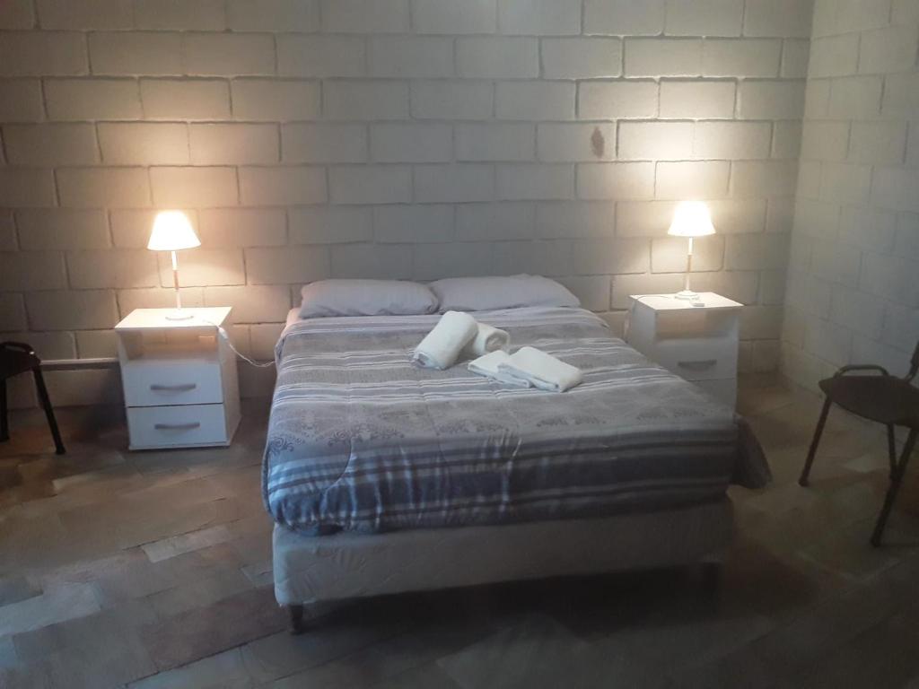 Katil atau katil-katil dalam bilik di Apartamento Barranco del Plata