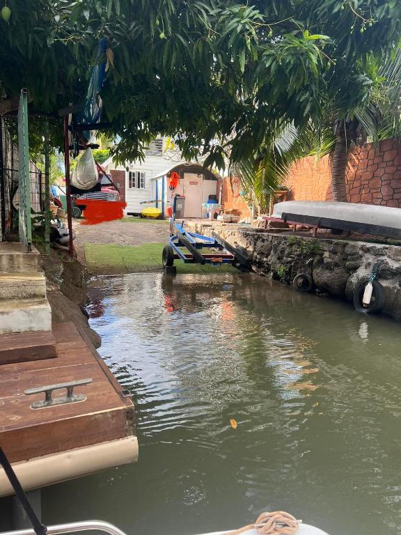 a body of water with a boat in it at chalet chenal in Hauru