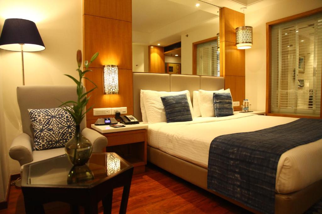 Voodi või voodid majutusasutuse The Place Gurugram, a member of Radisson Individuals toas