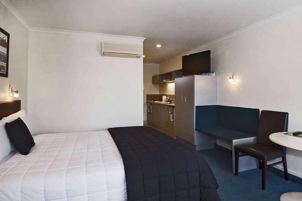 Postel nebo postele na pokoji v ubytování Quality Inn Napier