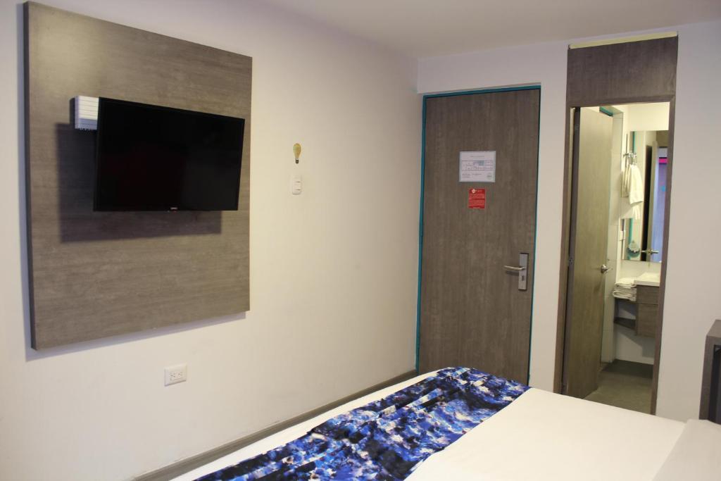 Postel nebo postele na pokoji v ubytování Agora Suites Self-Service Boutique Hotel