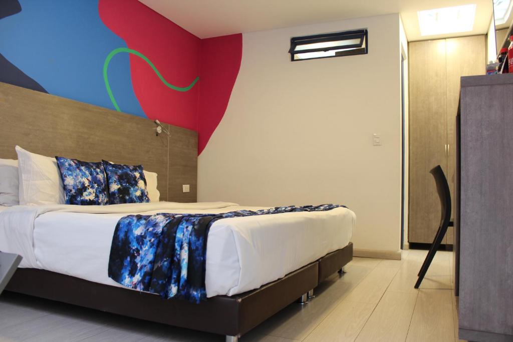 Postel nebo postele na pokoji v ubytování Agora Suites Self-Service Boutique Hotel