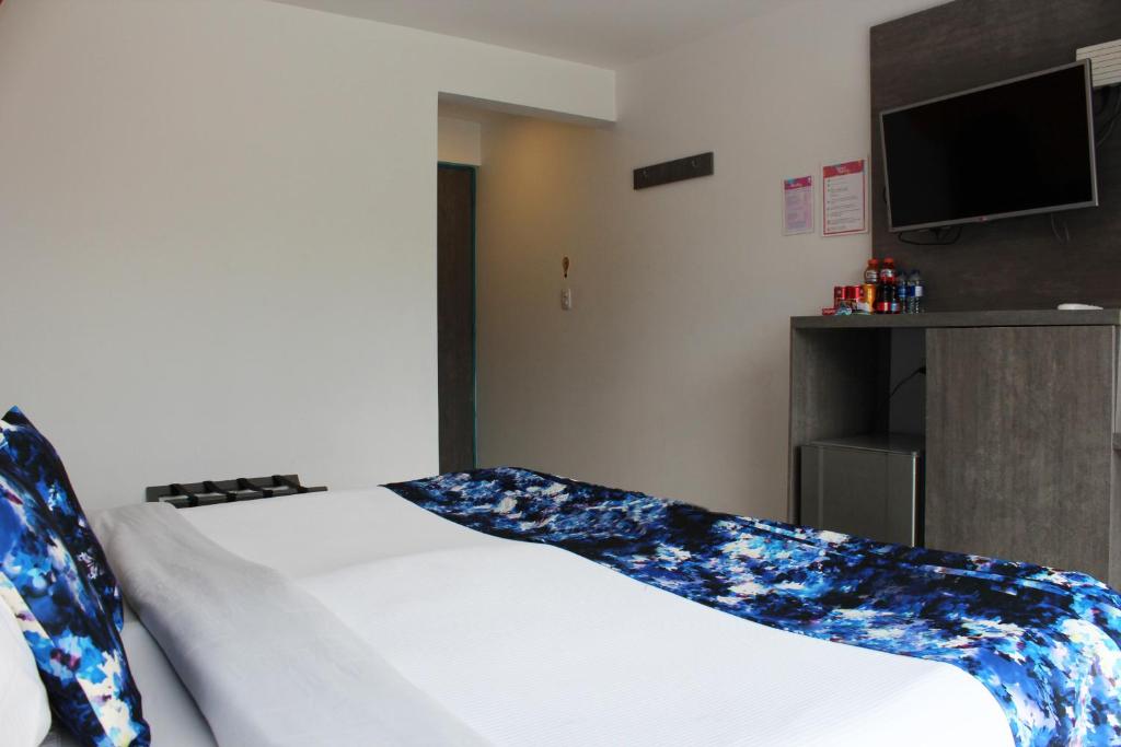 TV a/nebo společenská místnost v ubytování Agora Suites Self-Service Boutique Hotel
