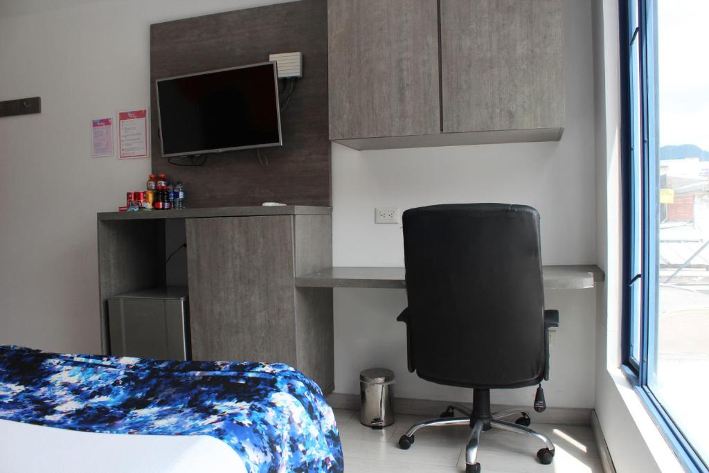TV a/nebo společenská místnost v ubytování Agora Suites Self-Service Boutique Hotel