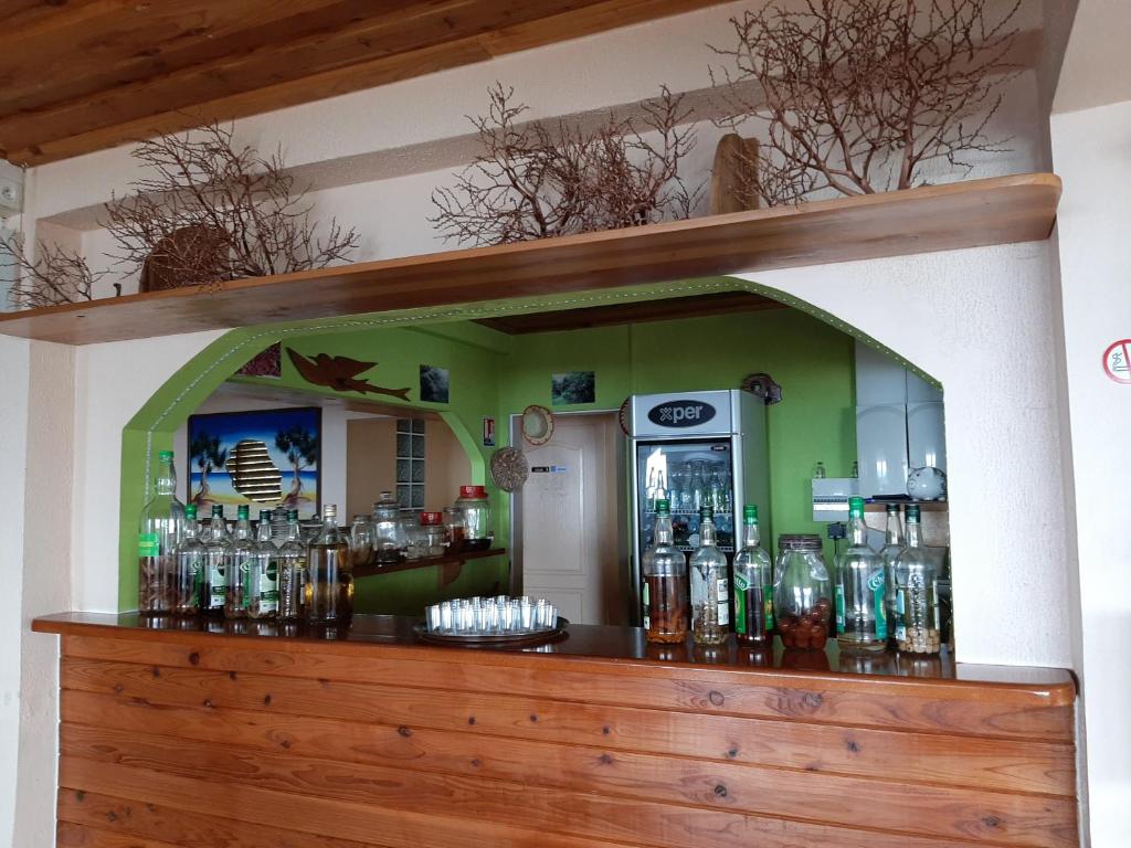 Lounge nebo bar v ubytování Ferme auberge le Ti'planteur