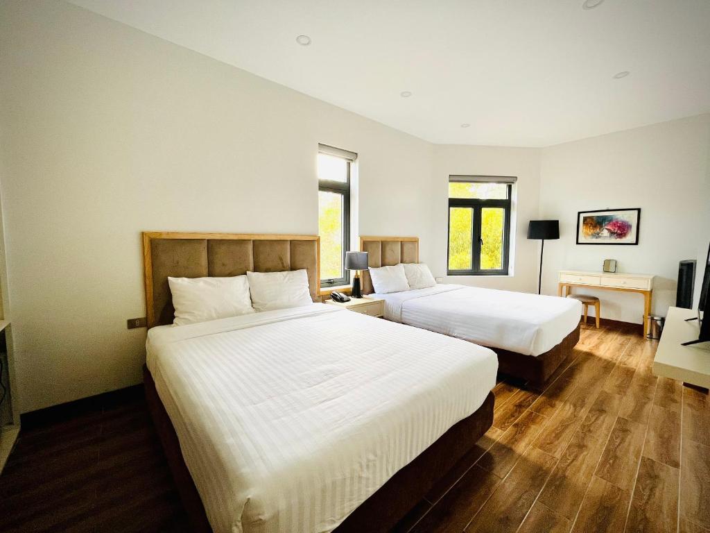 Postel nebo postele na pokoji v ubytování Hotel Du Ciel