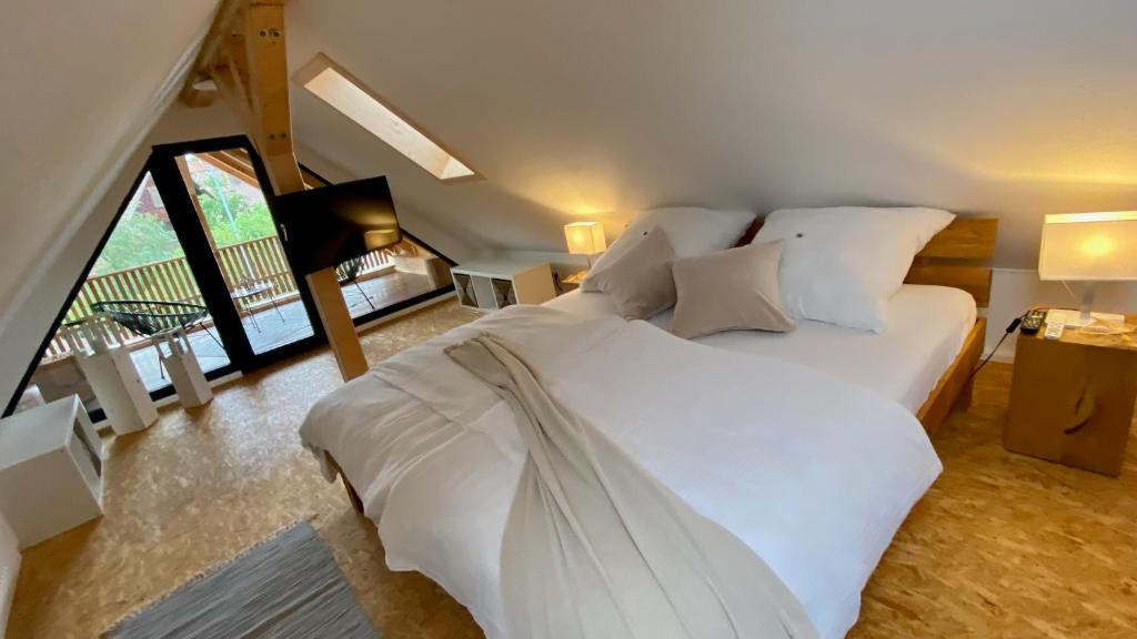 Postel nebo postele na pokoji v ubytování TinyLoft